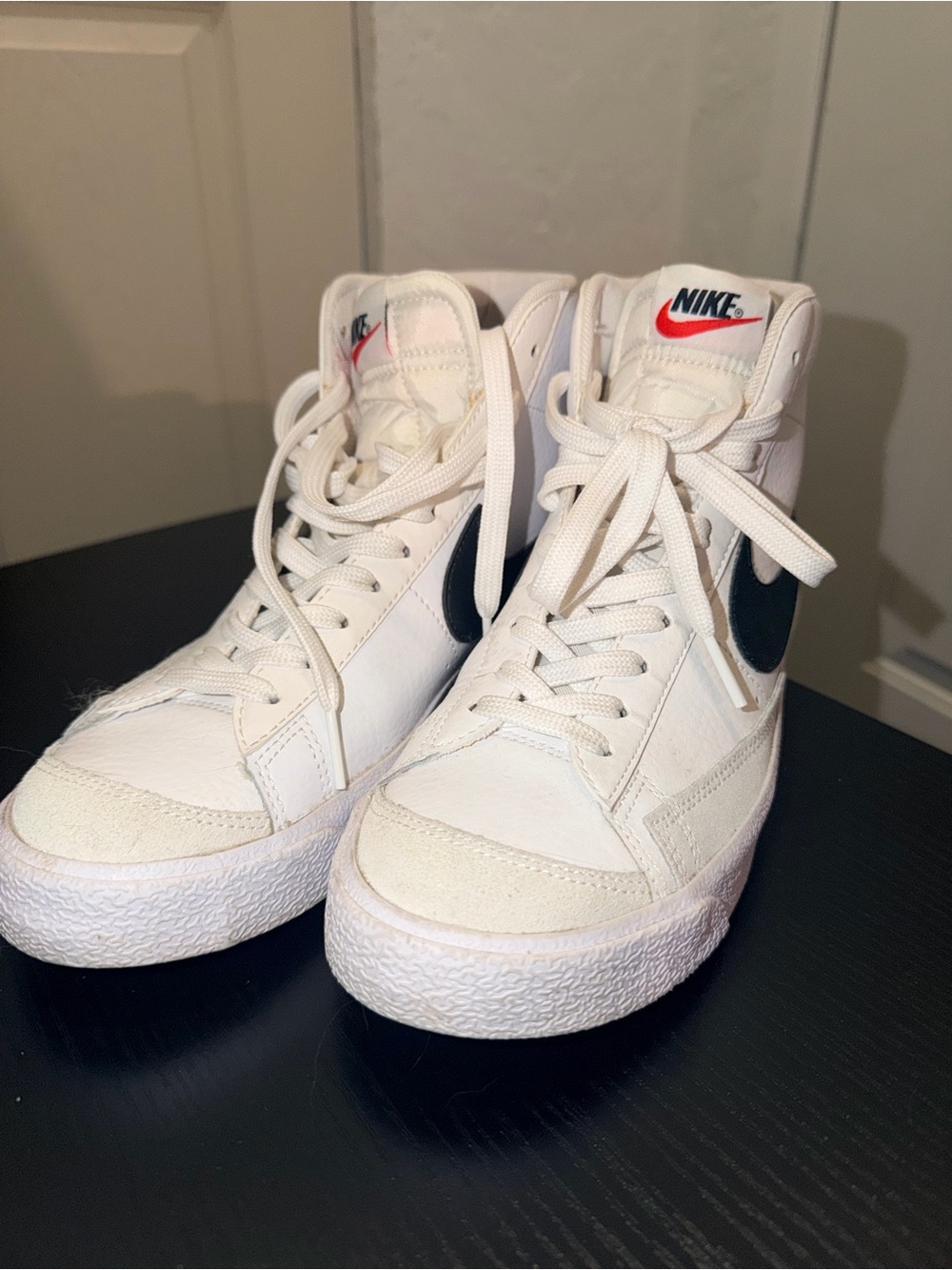 Nike Women’s White High-Top Sneakers with Black Swoosh